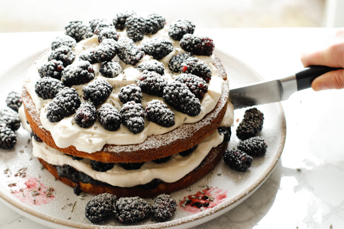 Victoria Sponge Cake with Blackberries and Lavender Cream - This Victoria sponge cake takes the traditional sponge cake to the next level. Talk about a stunning dessert. | circleofeaters.com